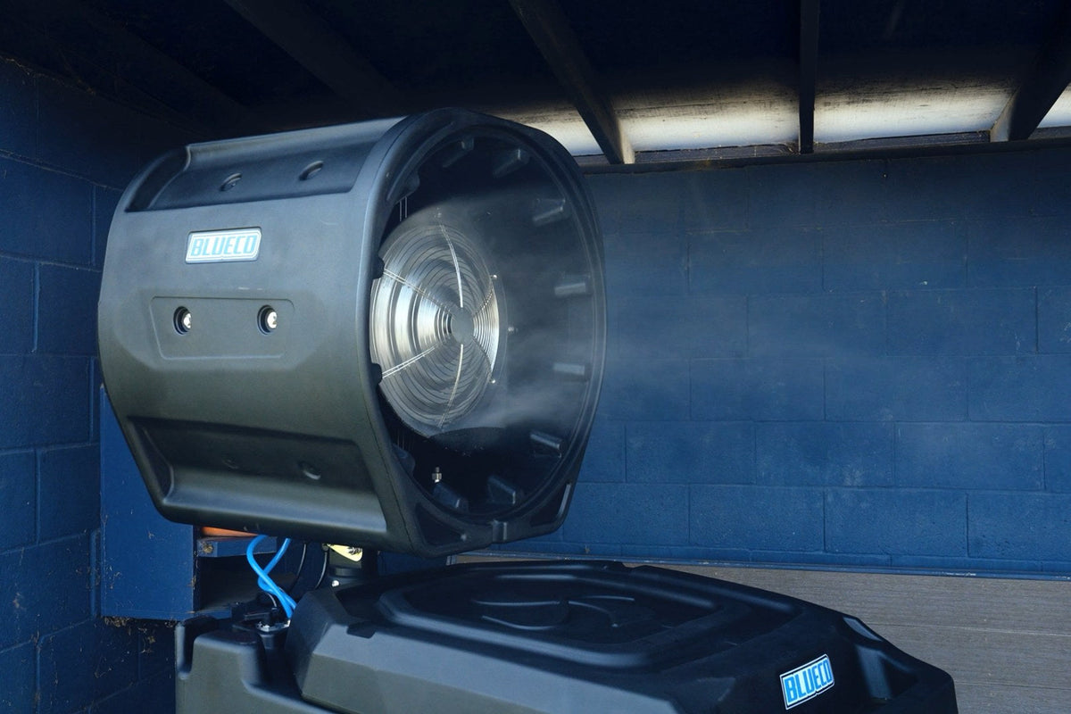 HydroBlu misting fan head spraying mist in a ballpark dugout