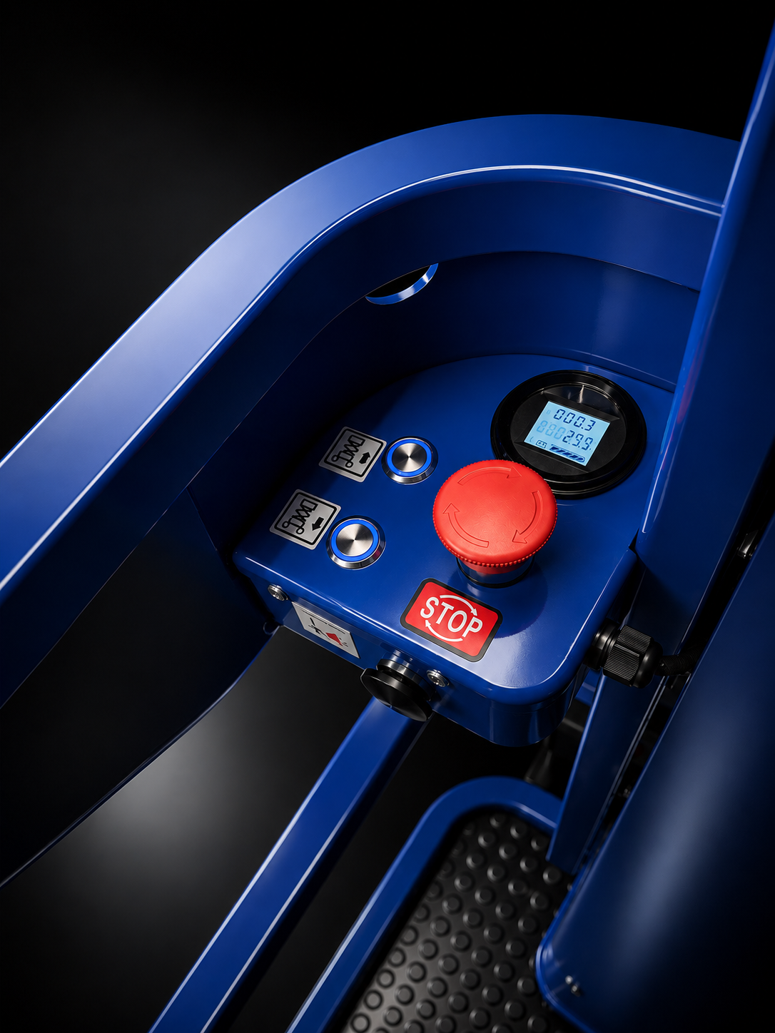 Order picker left-hand control console with its LCD display, buttons and red emergency stop, on black