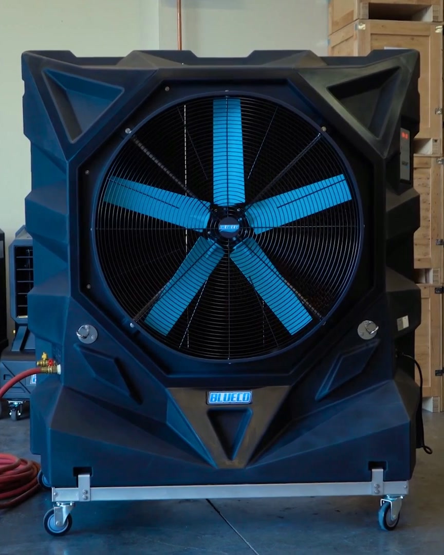 VARIANT-36 evaporative cooler beside smaller coolers and a stacker in a warehouse