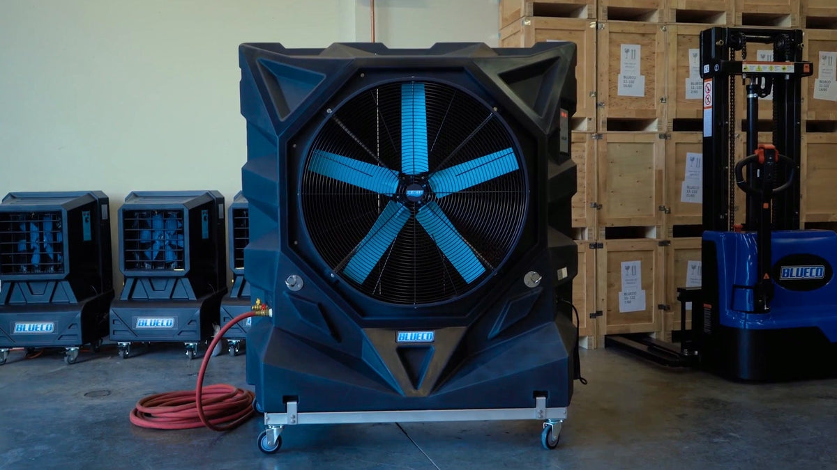 VARIANT-36 evaporative cooler beside smaller coolers and a stacker in a warehouse